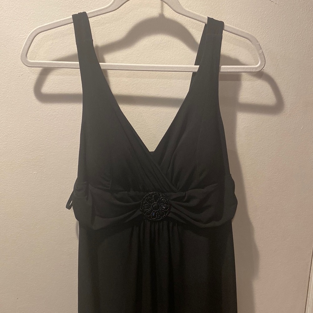 Black semi formal 3/4 length.